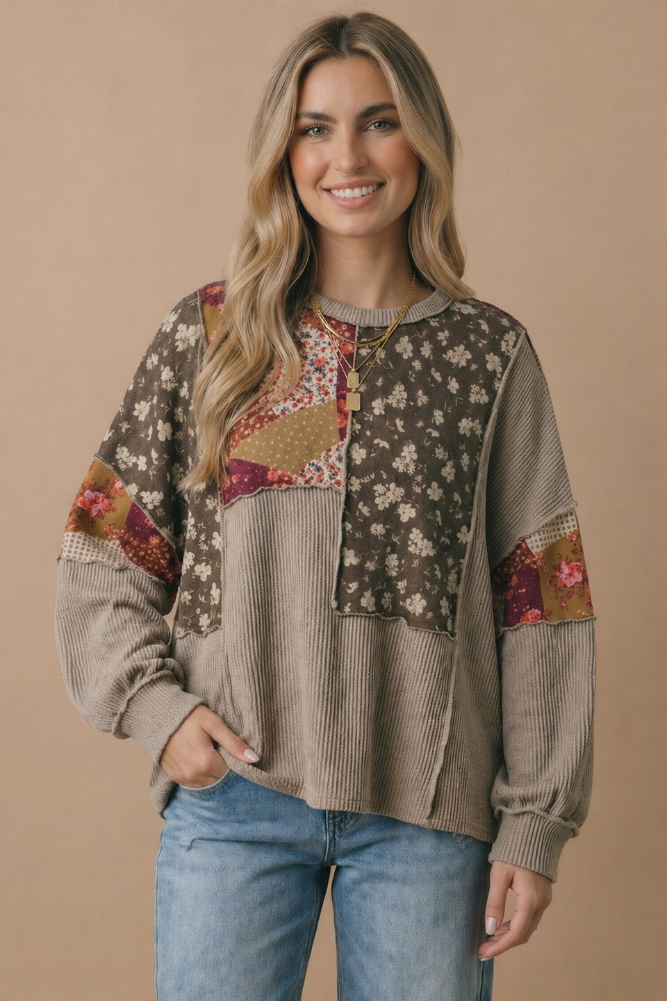 Floral patchwork knit top shown from the front, taupe and burgundy tones