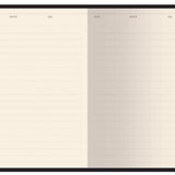 A6 vegan leather daily planner with a Forest Flowers cover and gilded page edges, detail view