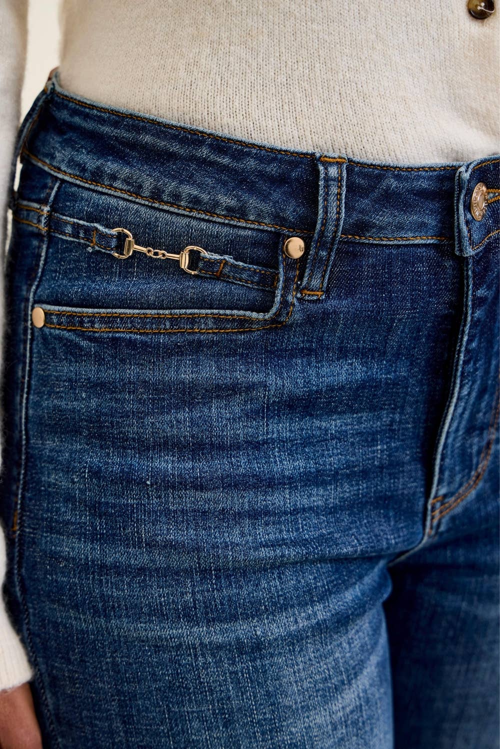 Close-up of the gold harness trim detail on the waistband of Judy Blue Daisy bootcut jeans