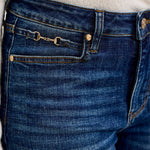 Close-up of the gold harness trim detail on the waistband of Judy Blue Daisy bootcut jeans