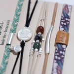 Flourish hair tie bracelet set in teal, black and tan with butterfly charm, view 3