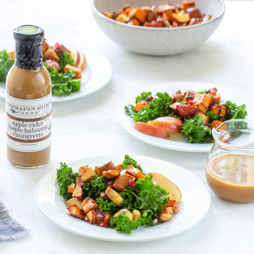 Kale and apple salads with roasted vegetables and Apple Cider Maple Balsamic Vinaigrette