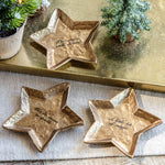 Three engraved star-shaped pewter dishes