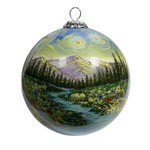 Reverse of the hiking ornament showing a creek, pine forest, and purple peaks under a swirling sky