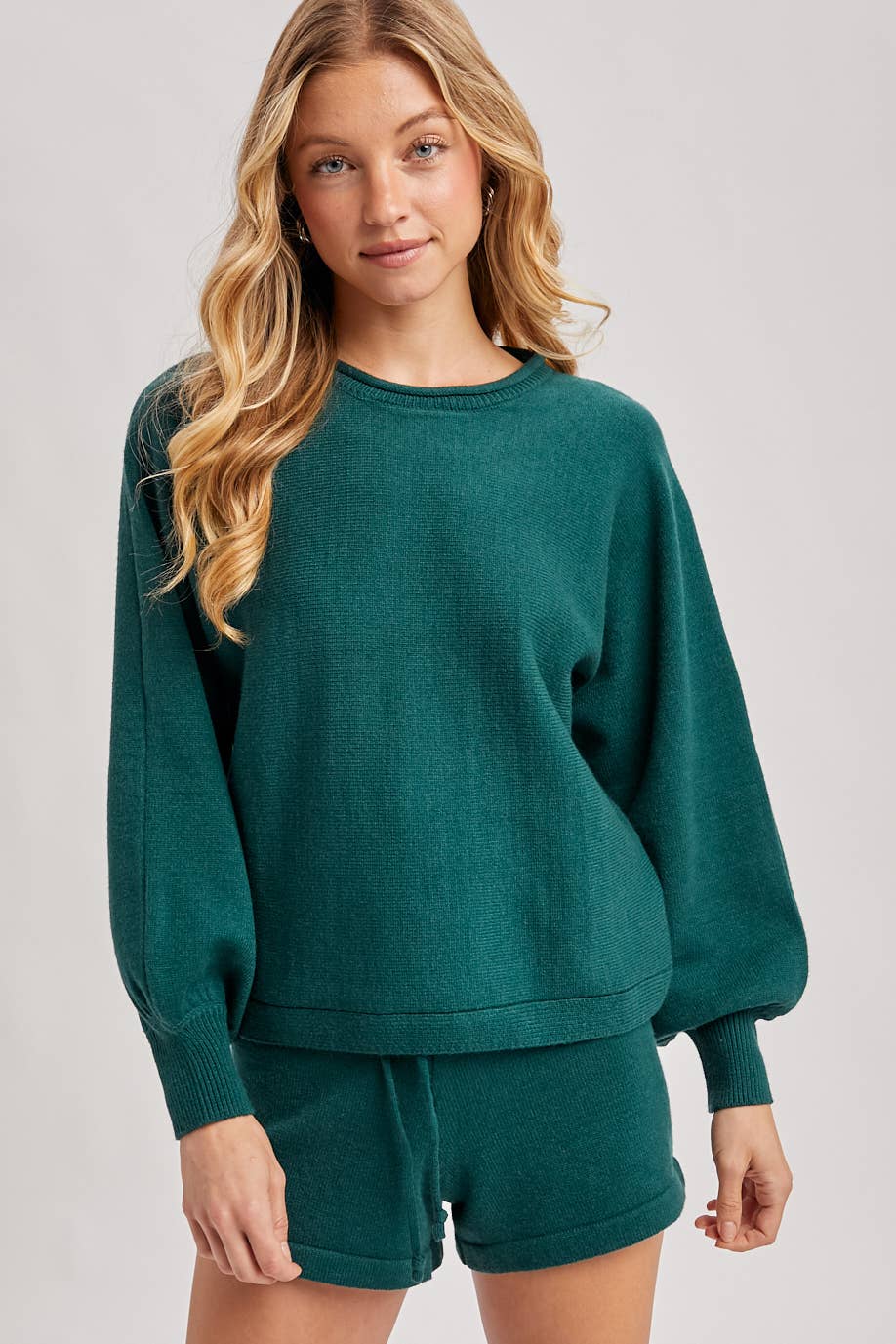 Hunter green ribbed knit lounge sweater with balloon sleeves and matching elastic waist shorts