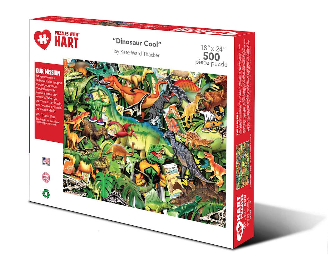 Dinosaur Cool 500-piece jigsaw puzzle box showing a jungle scene packed with colorful dinosaurs including T. rex and triceratops