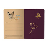 A5 soft-touch notebook with a dark floral and butterfly cover design, interior ruled pages