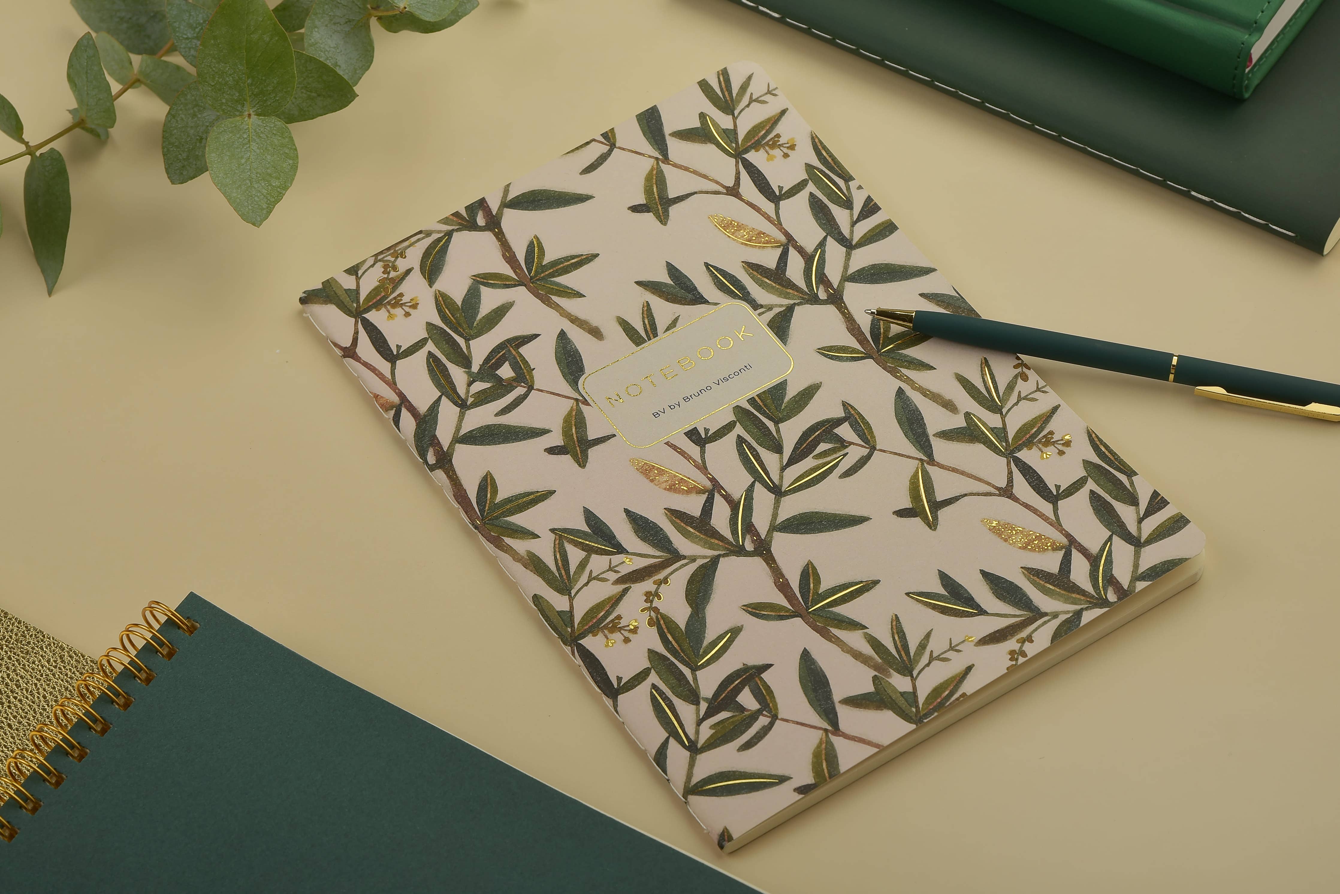 A5 soft-touch notebook with an olive branch cover design, interior ruled pages