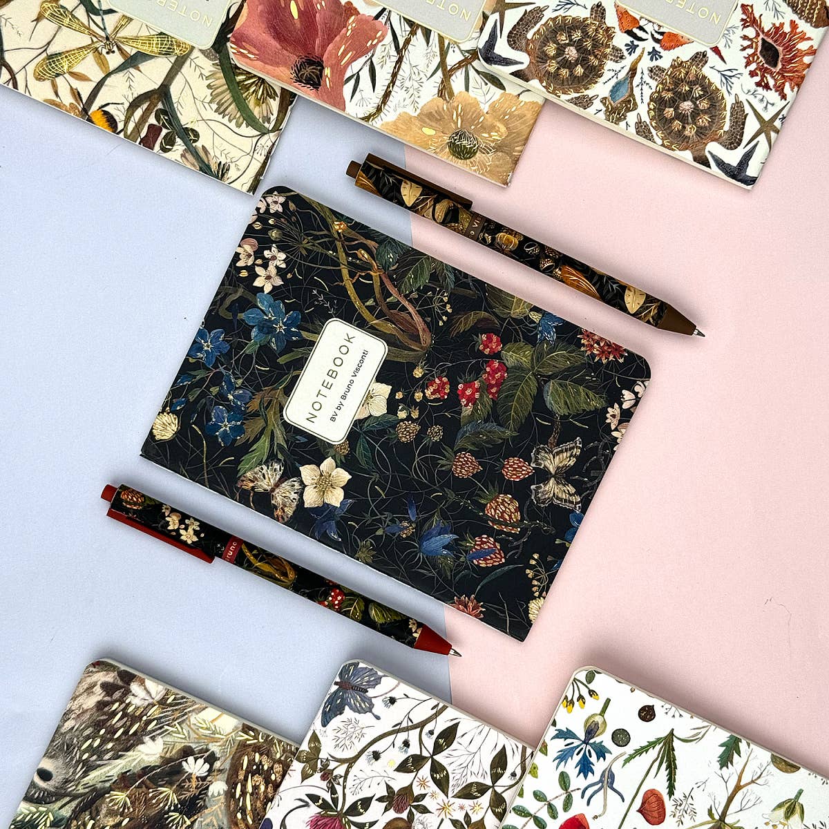 A6 passport-size pocket notebook with a Forest Flowers cover, interior ruled pages