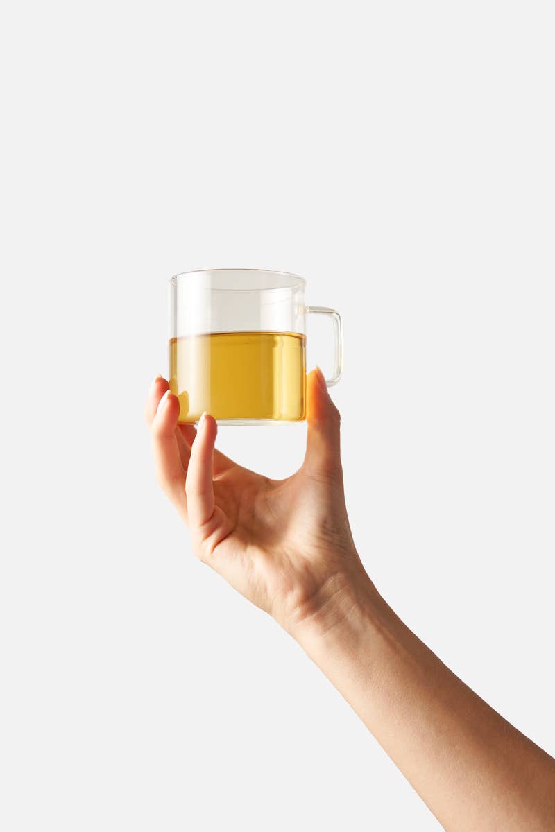 Cup of brewed Cozy Night chamomile mint herbal tea