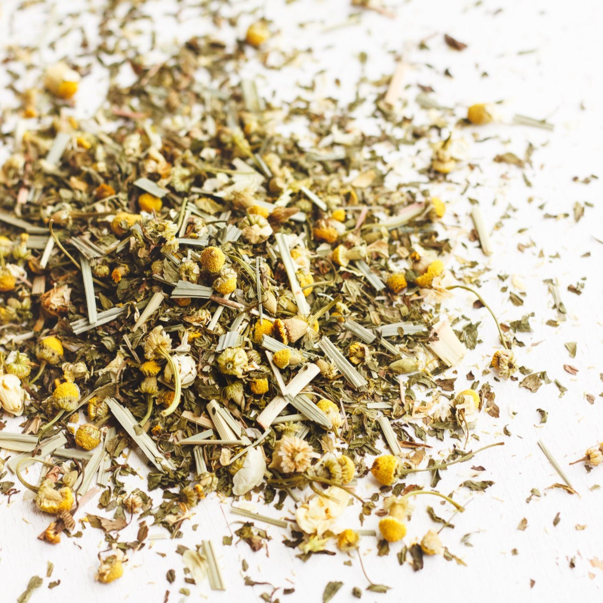Loose chamomile flowers, spearmint and lemongrass used in Chamomile Mint tea
