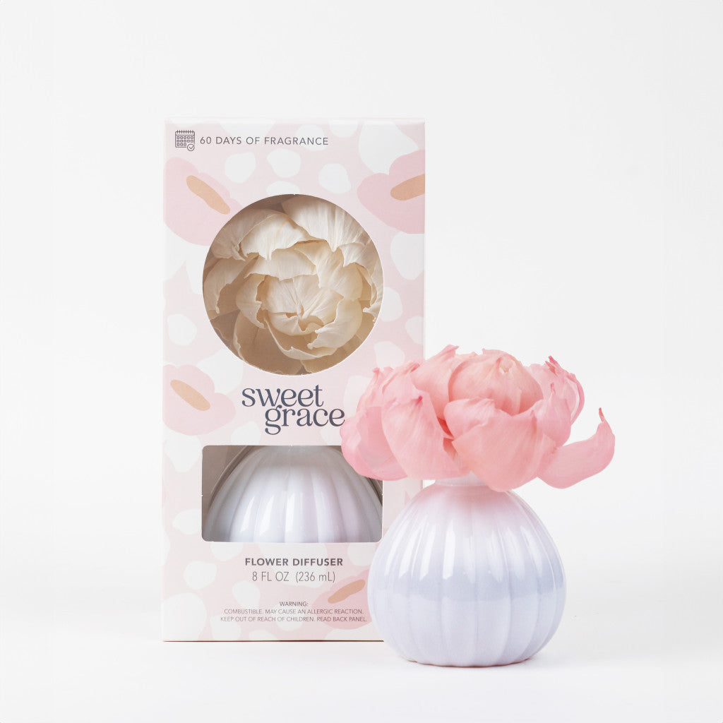 Bridgewater Sweet Grace Flower Diffuser with pink petals in a white rounded vase, shown beside its Sweet Grace gift box