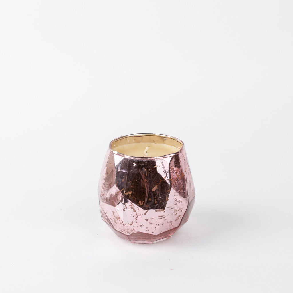 Bridgewater Sweet Grace faceted pink candle lit, the cut facets catching the glow