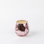 Bridgewater Sweet Grace faceted pink candle lit, the cut facets catching the glow