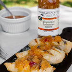 Grilled chicken breasts topped with Pineapple & Habanero Sauce