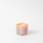 Bridgewater Sweet Grace candle in a pastel iridescent flower-shaped glass vessel with scalloped edges, on a white background