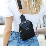 Kedzie Solstice Convertible Crossbody - Black, worn crossbody