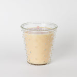 Bridgewater Sweet Grace candle in a clear hobnail glass jar with raised dots, on a white background